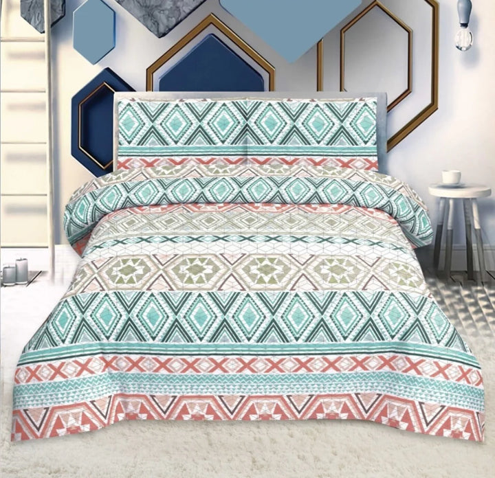 Geometric patterned bedding set on a bed in a room with decorative wall art.