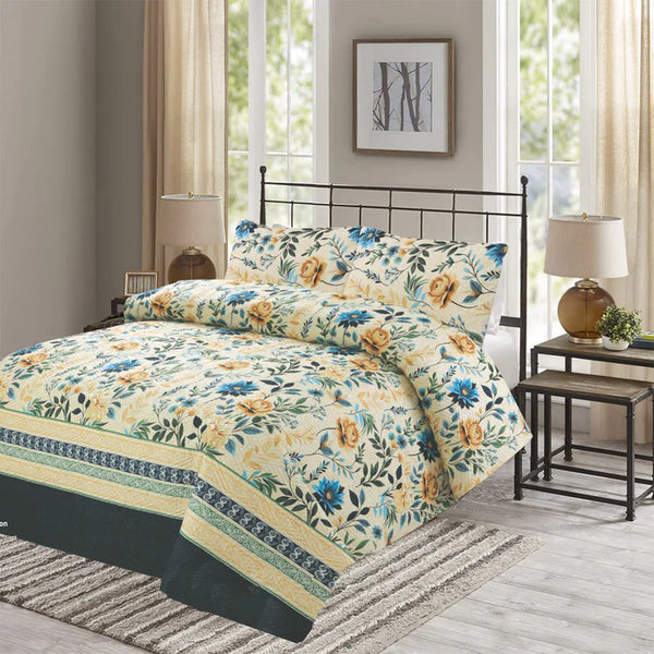 Floral bedding set on a bed in a bedroom with lamps and decor.