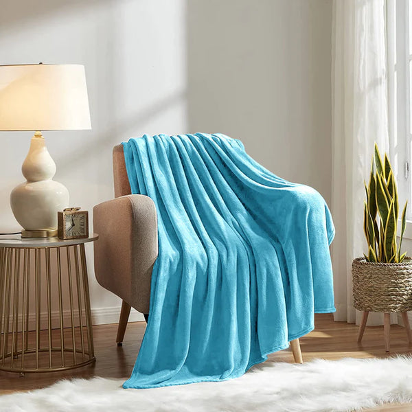 flannel moonlight sky blue plush blanket on sofa