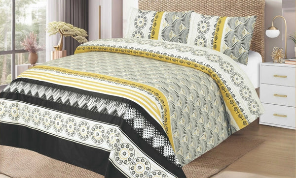 Bed with patterned bedding in a bedroom setting