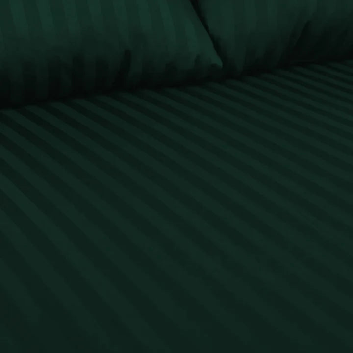 Dark green textured fabric with a subtle pattern