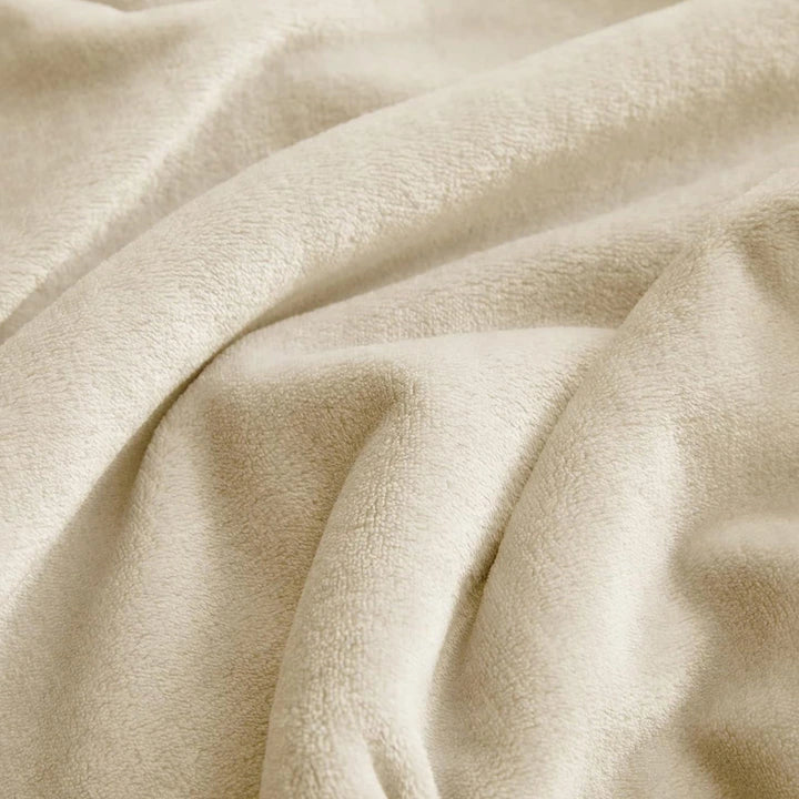 off white plush throw blanket close up view
