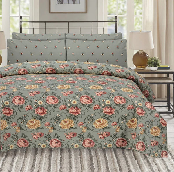 Floral duvet set on a bed with a matching headboard in a bedroom setting.