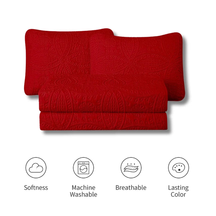 Red quilt with softness, machine washable, breathable, and lasting color icons below on a white background