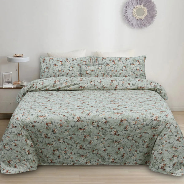 Floral patterned bedding set on a bed in a bedroom setting.